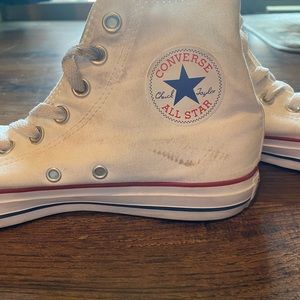 White high top Converse sneakers